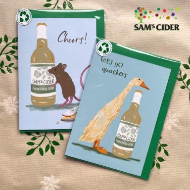 Two greeting cards featuring a mouse and a goose beside cider bottles.